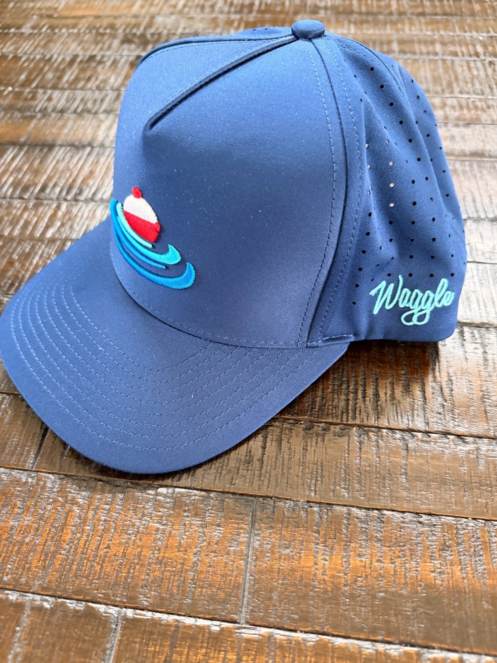 Waggle hat, worn once. Adjustable, snap back.